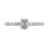 Emerald cut lab-grown diamond pavé solitaire ring in 18K recycled white gold